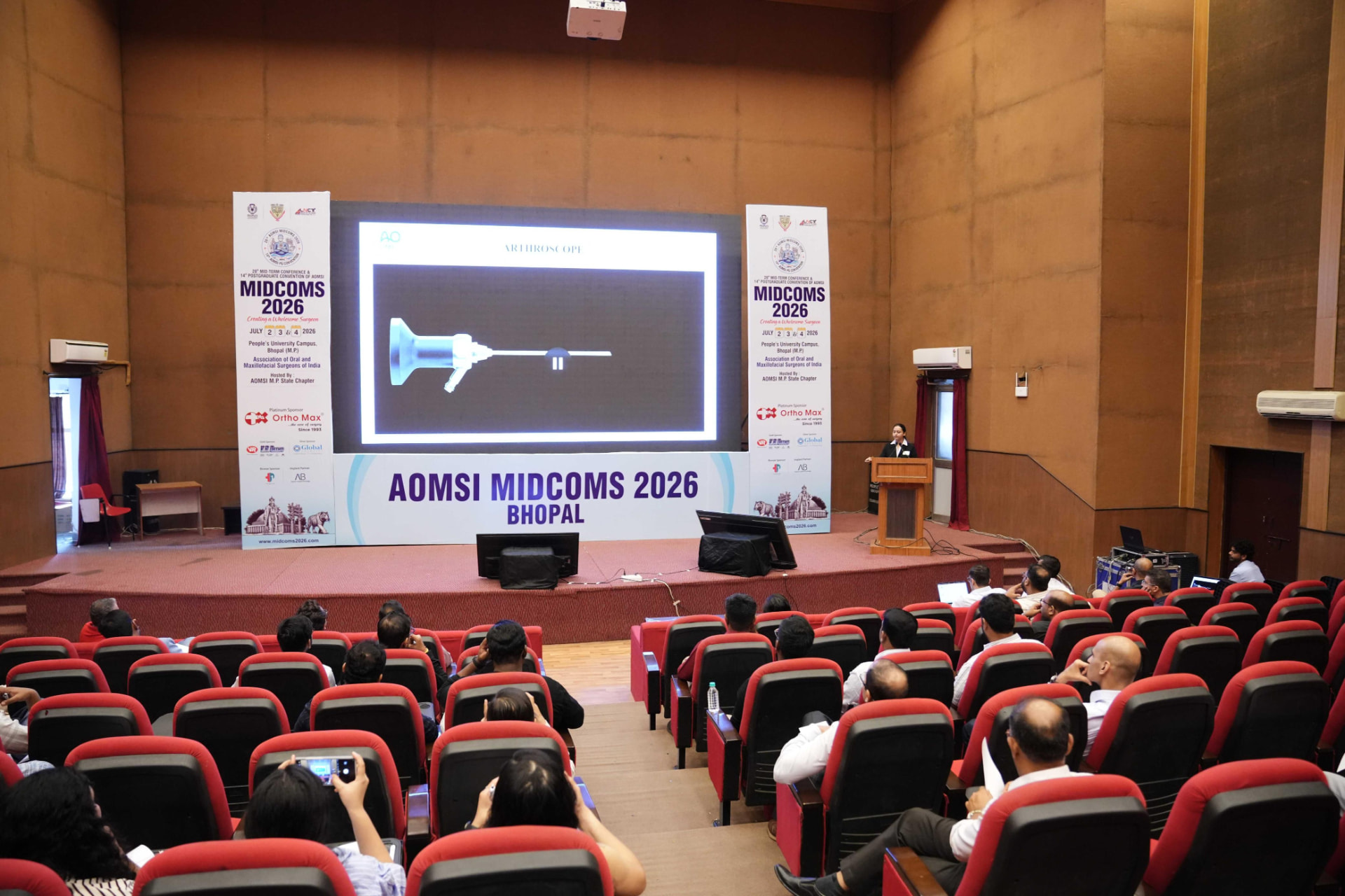 Speaking on TMJ arthroscopy · AOMSI MIDCOMS 2026, Bhopal
